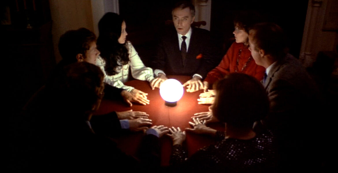 Count Yorga leads the seance.