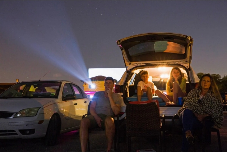 Family at Drive-In Theater.